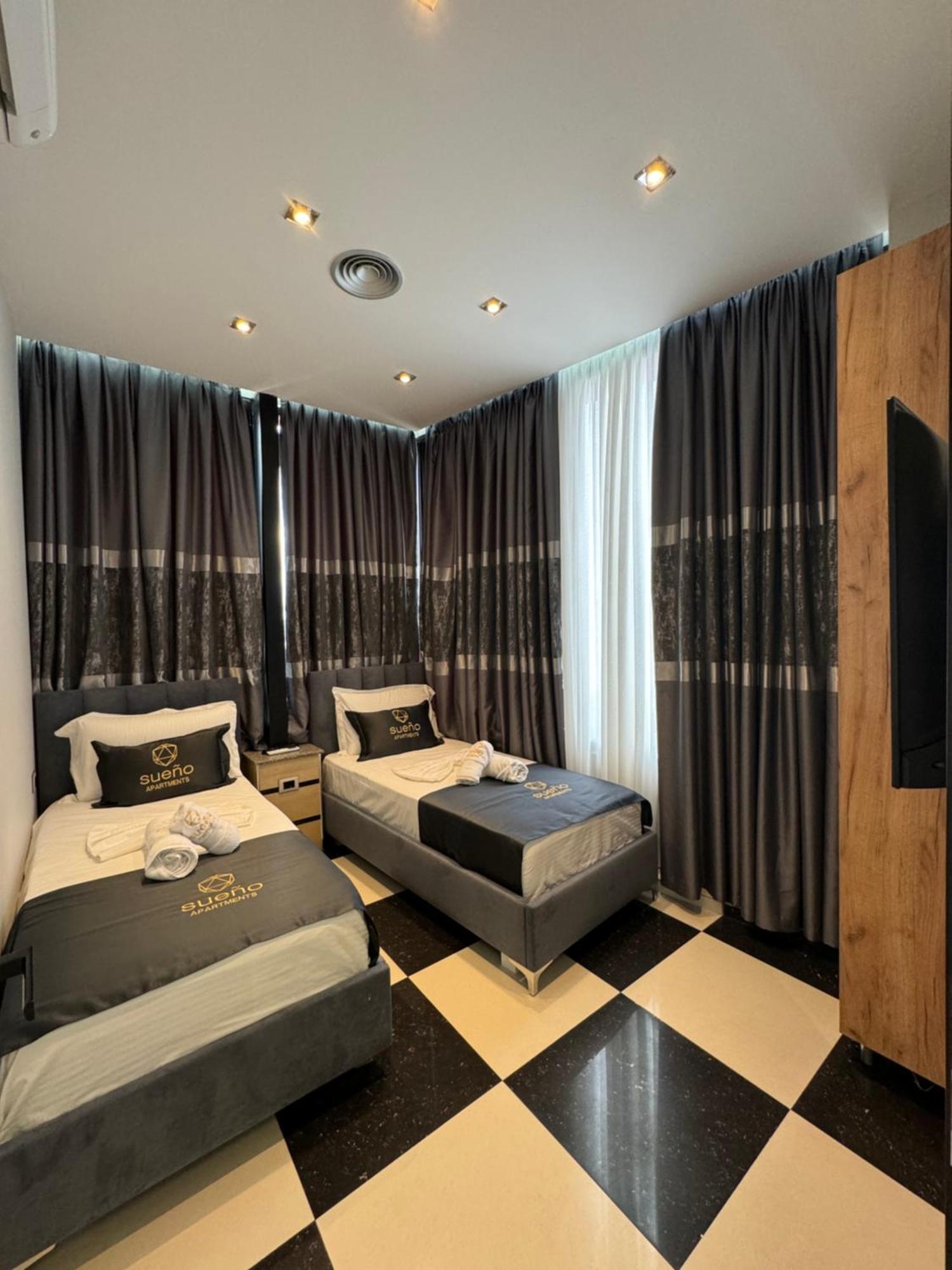 Sueno Apartments & Suites Tirana Habitación foto